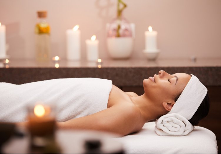 s6 team beautiful woman lying on massage table 74NTY85